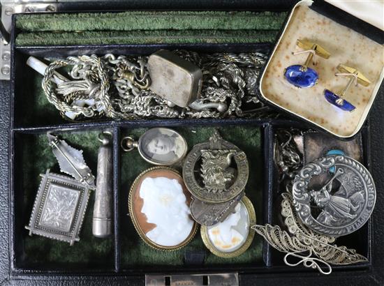 A jewellery box of costume and silver jewellery.